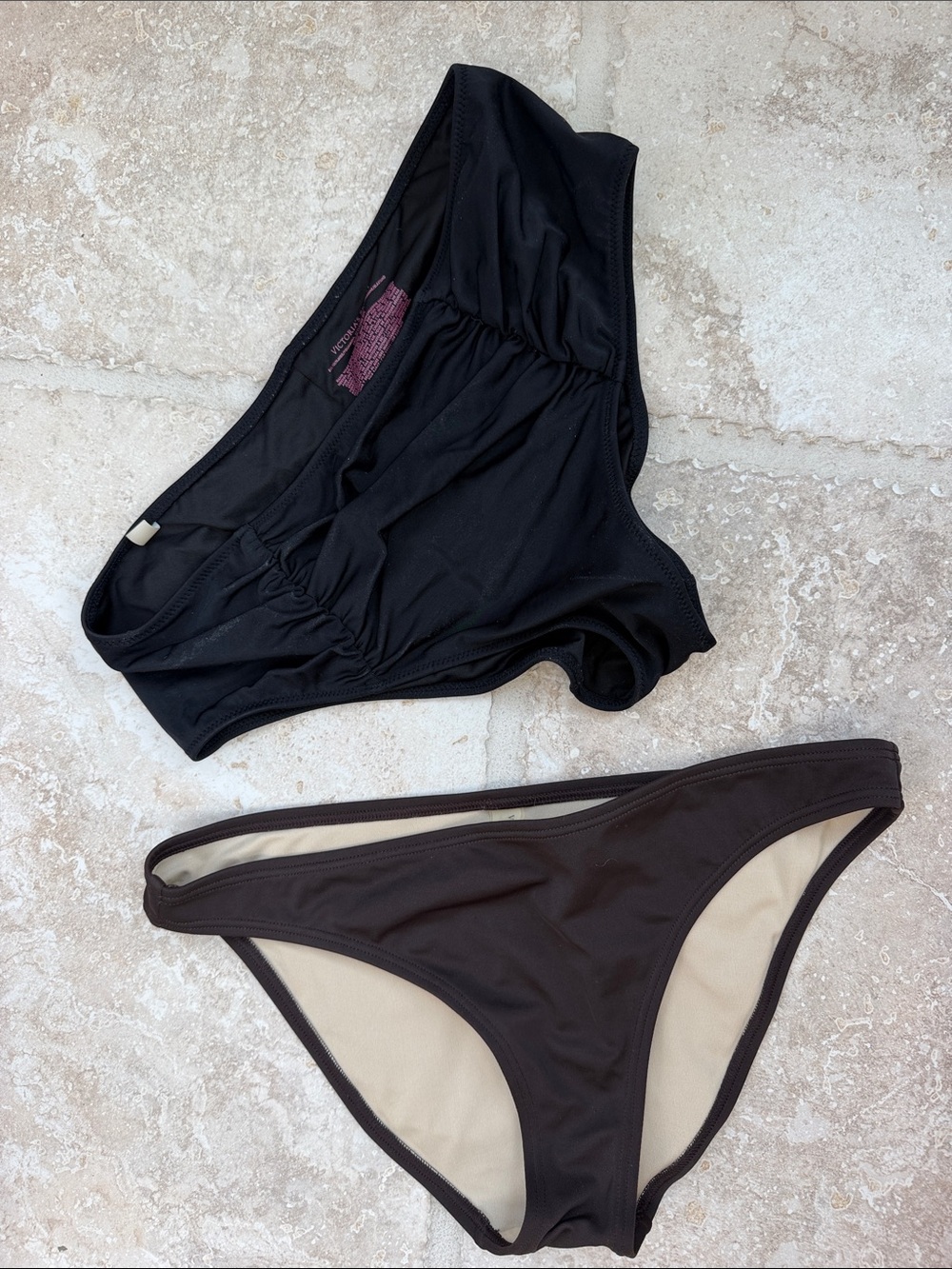 2 Victorias Secret bottoms size medium. Been sitting in bureau. Good condition.
